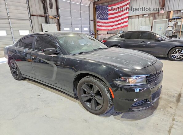 2C3CDXHG7JH328657 2018 DODGE CHARGER Черный Передняя правая четверть