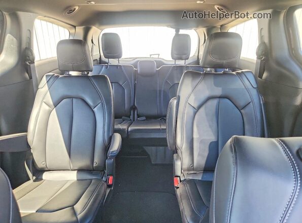 2C4RC1BG3TR225697 2026 CHRYSLER PACIFICA Black Rear seats view