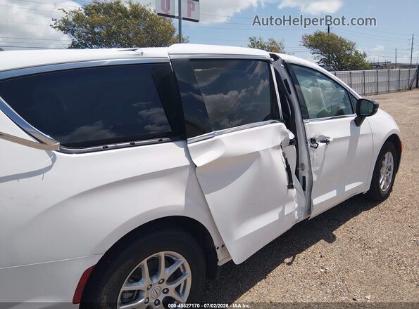 2C4RC1CG7TR161307 2026 CHRYSLER VOYAGER White Widok wnętrza z tyłu