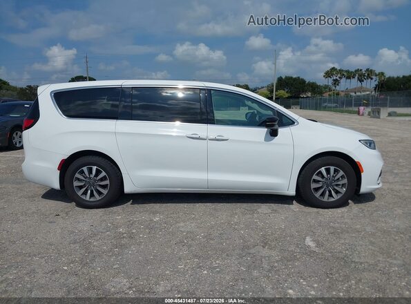 2C4RC1S7XRR160811 2024 CHRYSLER PACIFICA White Widok wnętrza z tyłu