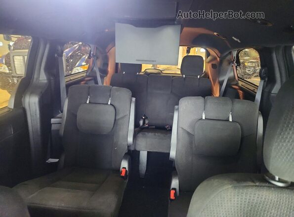 2C4RDGEG7GR319566 2016 DODGE GRAND Black Rear seats view