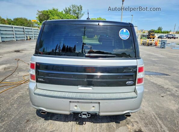 2FMGK5C81GBA17658 2016 FORD FLEX Silver Vista de los asientos traseros