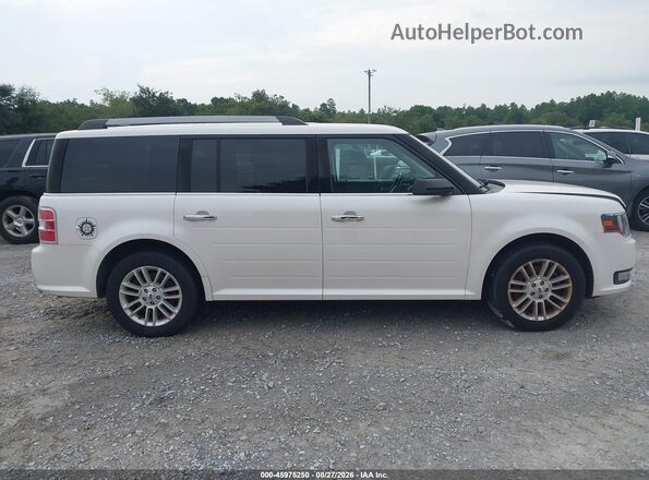 2FMGK5C82JBA02030 2018 FORD FLEX White Widok wnętrza z tyłu