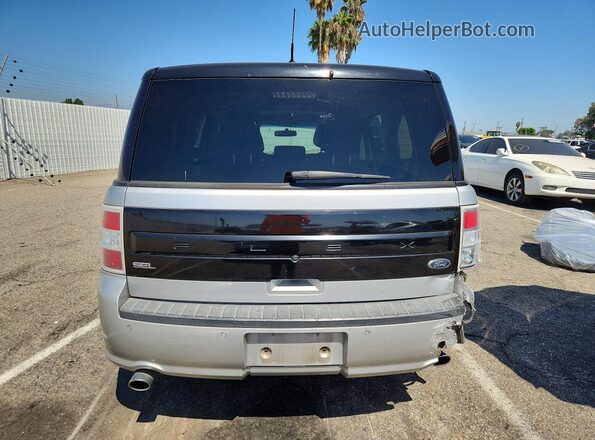 2FMGK5C8XHBA10404 2017 FORD FLEX Серебряный Вид сзади