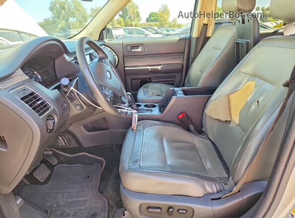 2FMGK5C8XHBA10404 2017 FORD FLEX Серебряный Вид салона спереди