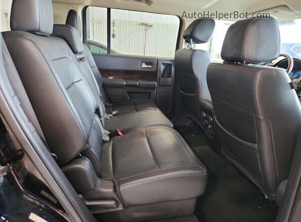 2FMHK6D80JBA14539 2018 FORD FLEX Black Widok wnętrza z tyłu