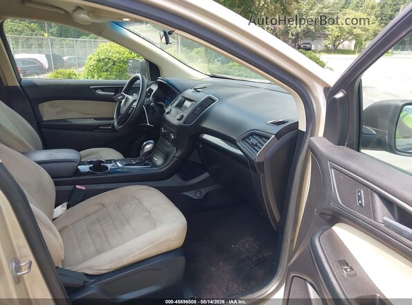 2FMPK3G90HBC40525 2017 FORD EDGE Gold Вид салону спереду