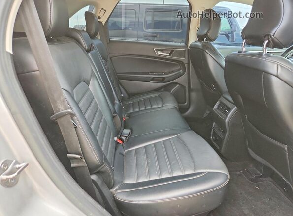 2FMPK3J90HBB25402 2017 FORD EDGE Серый Вид задней части салона