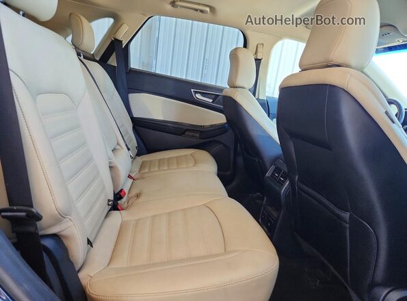 2FMPK3J90LBB02906 2020 FORD EDGE Blue Vista de los asientos traseros