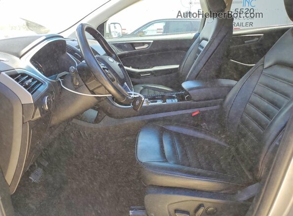2FMPK3J90LBB47022 2020 FORD EDGE Серебряный Вид салона спереди