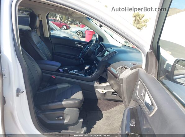 2FMPK3J92HBB94592 2017 FORD EDGE White Widok wnętrza z przodu