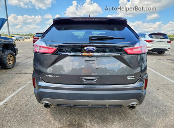 2FMPK3J94KBC45579 2019 FORD EDGE Gray Vista trasera