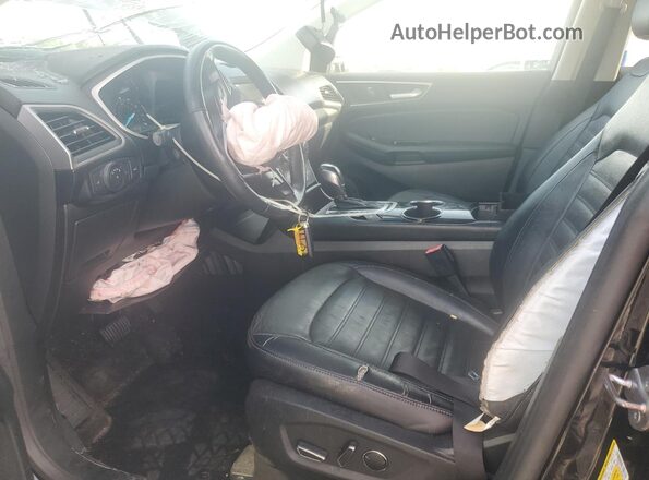 2FMPK3J96JBB66736 2018 FORD EDGE Черный Вид салона спереди