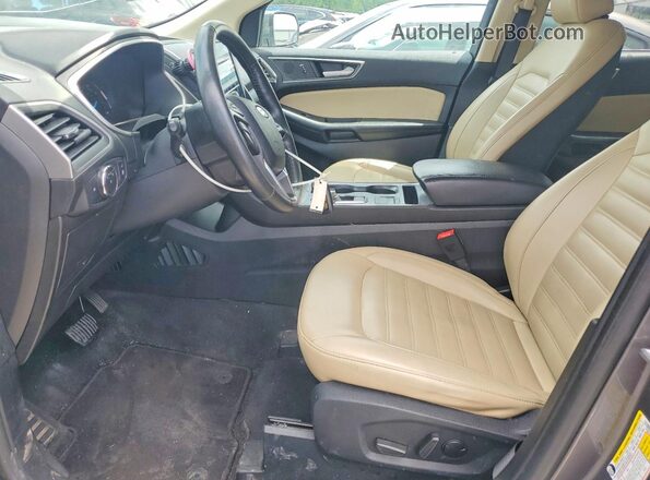 2FMPK3J99MBA65632 2021 FORD EDGE Gray Вид салону спереду