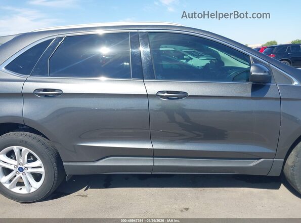 2FMPK3J9XLBA89744 2020 FORD EDGE Black Вид задньої частини салону