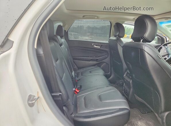 2FMPK3K80GBB09298 2016 FORD EDGE White Vista de los asientos traseros