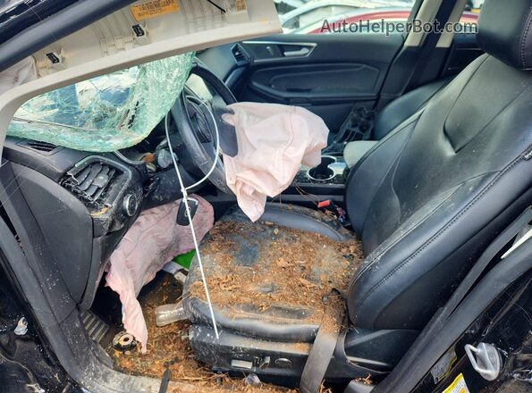 2FMPK3K91HBC07511 2017 FORD EDGE Черный Вид салона спереди