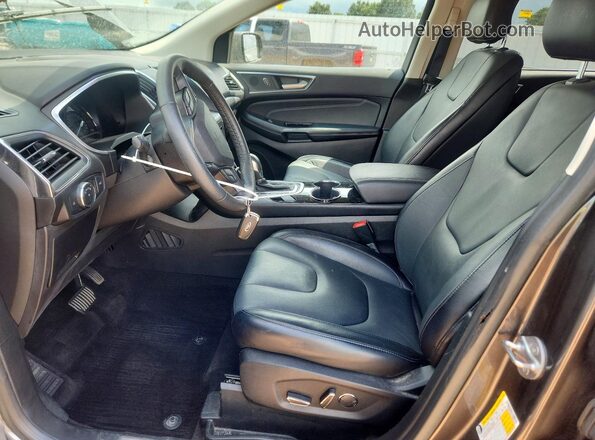 2FMPK3K98JBB86243 2018 FORD EDGE Silver Front interior view