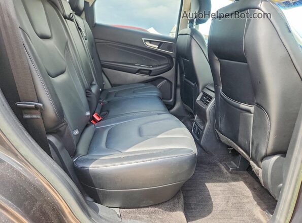 2FMPK3K98JBB86243 2018 FORD EDGE Silver Rear interior view