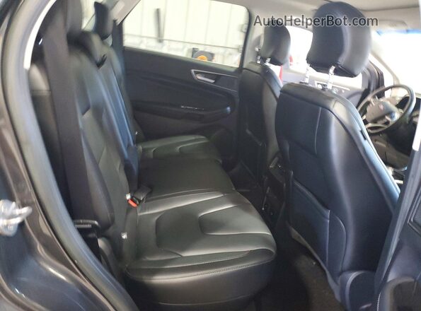 2FMPK3K9XKBB24652 2019 FORD EDGE Gray Rear seats view