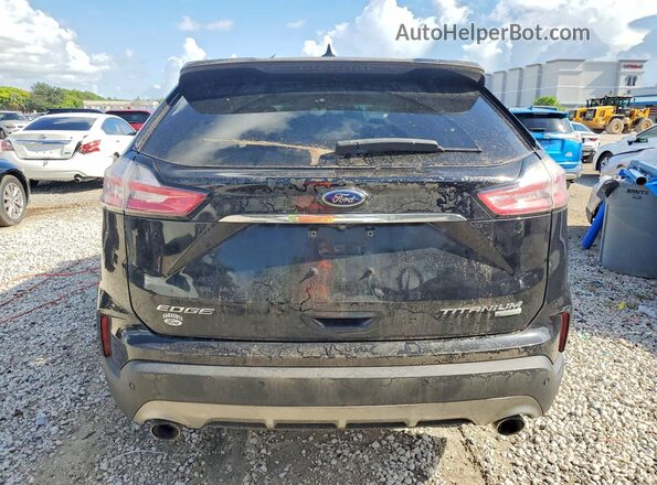 2FMPK3K9XKBB42391 2019 FORD EDGE Черный Вид задней части салона