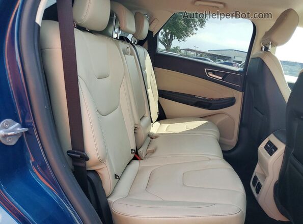 2FMPK3K9XLBA19949 2020 FORD EDGE Синий Вид задней части салона