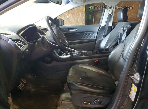 2FMPK4AP7GBB82053 2016 FORD EDGE Black Front interior view