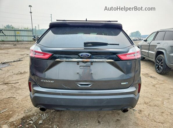2FMPK4G93KBB41372 2019 FORD EDGE Gray Rear view