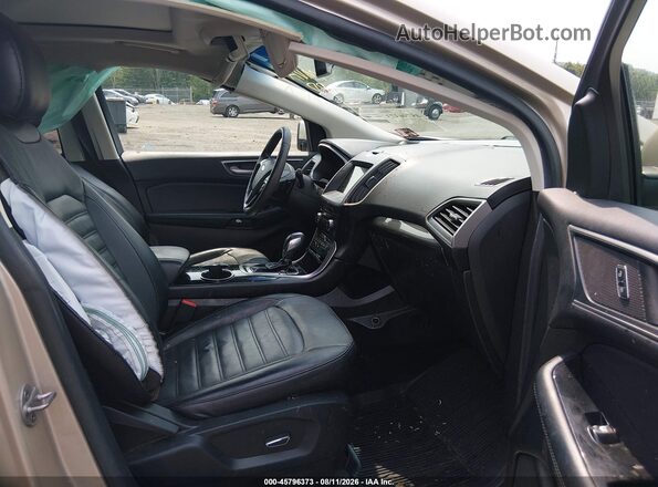 2FMPK4J81HBC57498 2017 FORD EDGE Gold Вид салону спереду