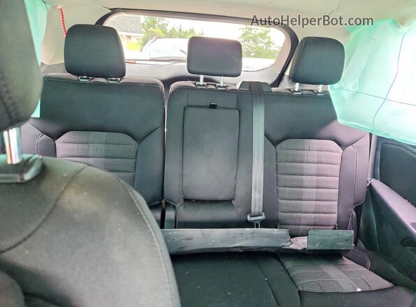 2FMPK4J81JBC46474 2018 FORD EDGE Tan Rear seats view