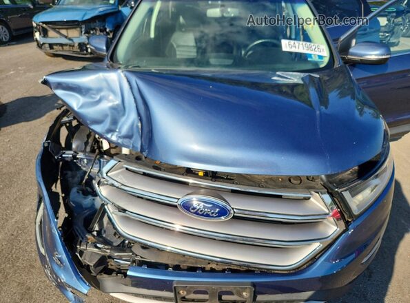 2FMPK4J88JBB35209 2018 FORD EDGE Blue უკანა სალონის ხედი