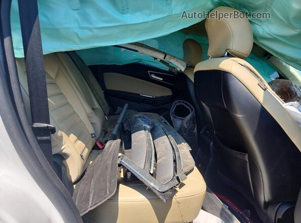 2FMPK4J89GBB84783 2016 FORD EDGE White Vista de los asientos traseros