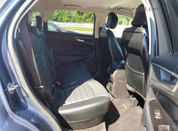 2FMPK4J89JBB47465 2018 FORD EDGE Gray Rear interior view