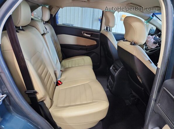 2FMPK4J8XGBC11327 2016 FORD EDGE Blue Widok tylnych siedzeń