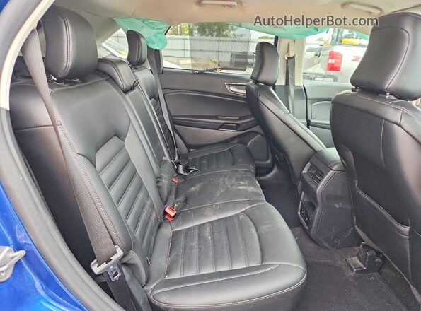 2FMPK4J90MBA59269 2021 FORD EDGE Blue Вид задньої частини салону