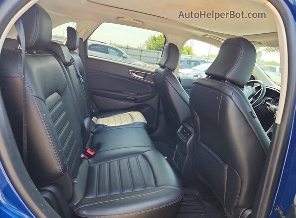 2FMPK4J90NBA85307 2022 FORD EDGE Blue Widok wnętrza z tyłu