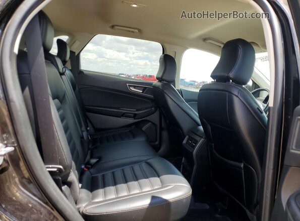 2FMPK4J90RBA85362 2024 FORD EDGE Черный Вид задней части салона