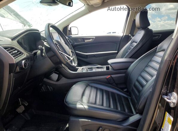 2FMPK4J90RBA85362 2024 FORD EDGE Черный Вид салона спереди