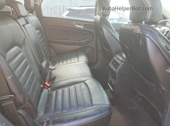 2FMPK4J91JBB72823 2018 FORD EDGE Purple Սալոնի հետևի տեսք