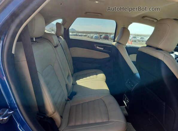 2FMPK4J91NBA22460 2022 FORD EDGE Blue Vista de los asientos traseros