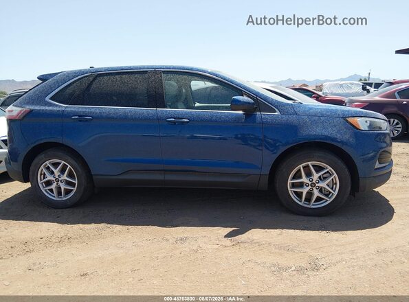 2FMPK4J91PBA42677 2023 FORD EDGE Blue Սալոնի հետևի տեսք
