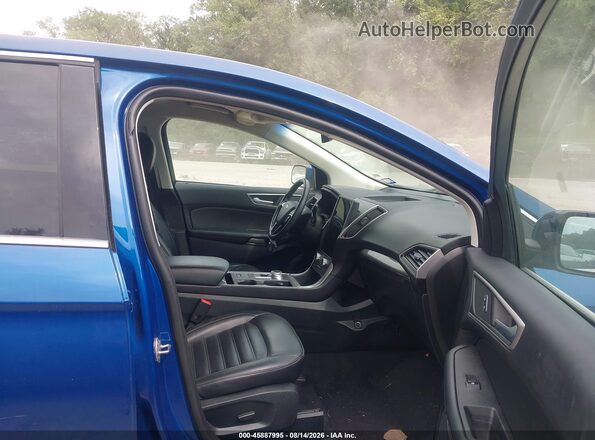 2FMPK4J91RBA78680 2024 FORD EDGE Blue წინა სალონის ხედი