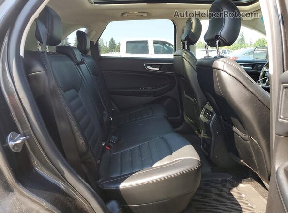 2FMPK4J92HBC56675 2017 FORD EDGE Gray Rear interior view