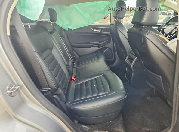 2FMPK4J92RBA55084 2024 FORD EDGE Silver უკანა სალონის ხედი
