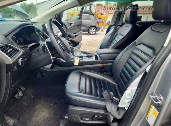 2FMPK4J92RBA55084 2024 FORD EDGE Silver წინა სალონის ხედი