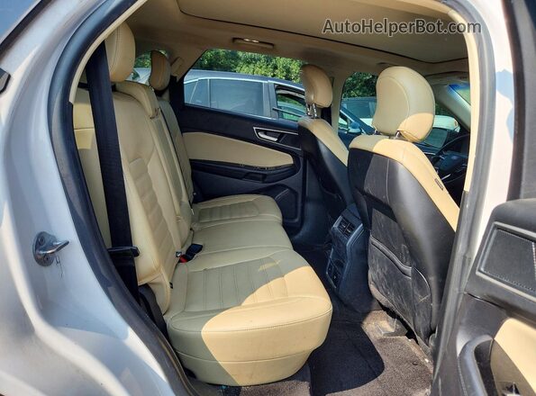 2FMPK4J93JBC21889 2018 FORD EDGE Black Вид задньої частини салону