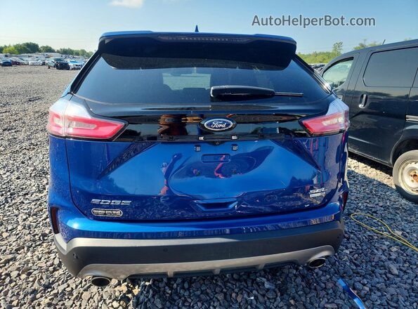 2FMPK4J93LBA89462 2020 FORD EDGE Blue Rear view