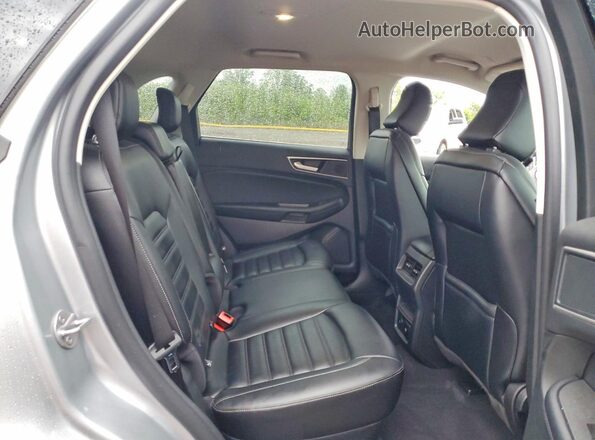 2FMPK4J93RBA12664 2024 FORD EDGE Серебряный Вид задней части салона