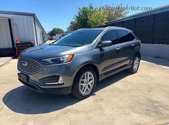 2FMPK4J93RBA18013 2024 FORD EDGE Gray Trasero izquierdo