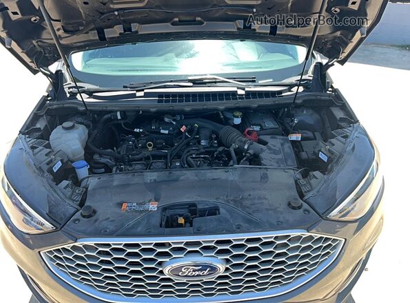 2FMPK4J93RBA18013 2024 FORD EDGE Gray Vista interior delantera